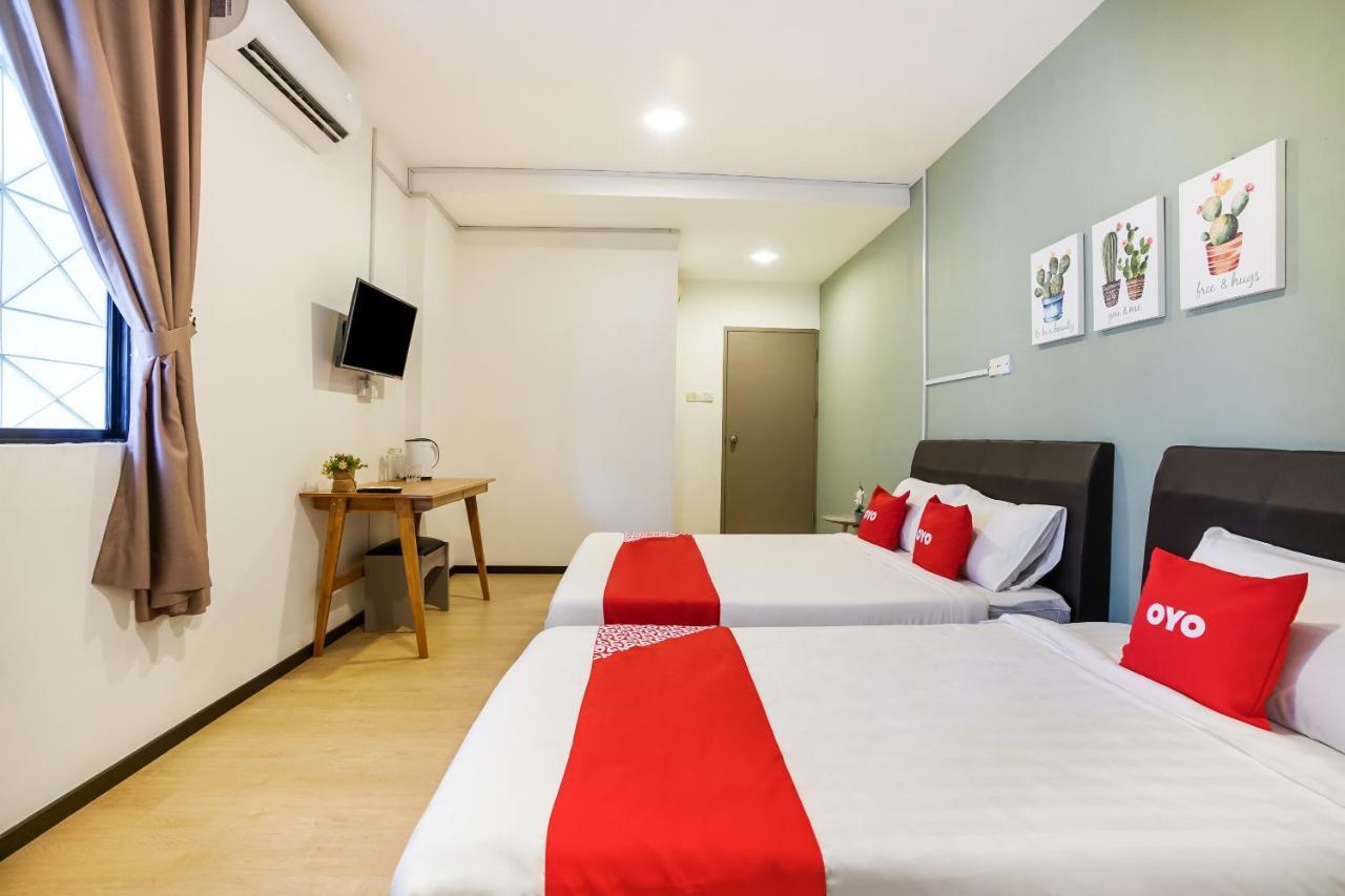 Oyo 89603 Treeline Urban Inn Кота-Кинабалу Экстерьер фото