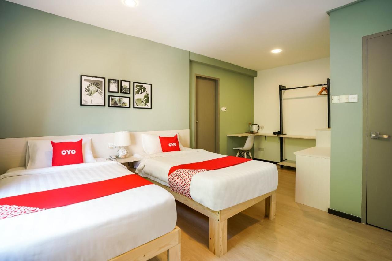 Oyo 89603 Treeline Urban Inn Кота-Кинабалу Экстерьер фото