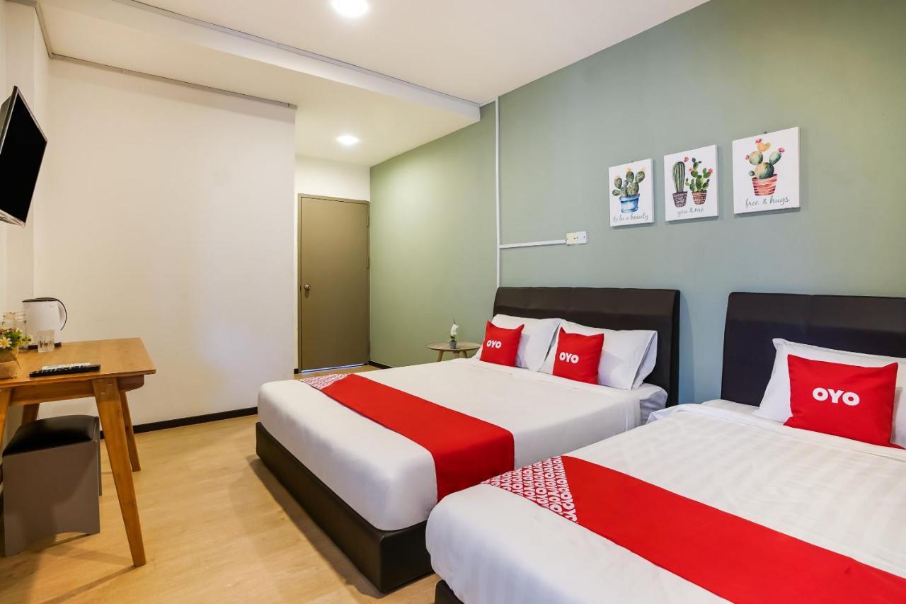 Oyo 89603 Treeline Urban Inn Кота-Кинабалу Экстерьер фото
