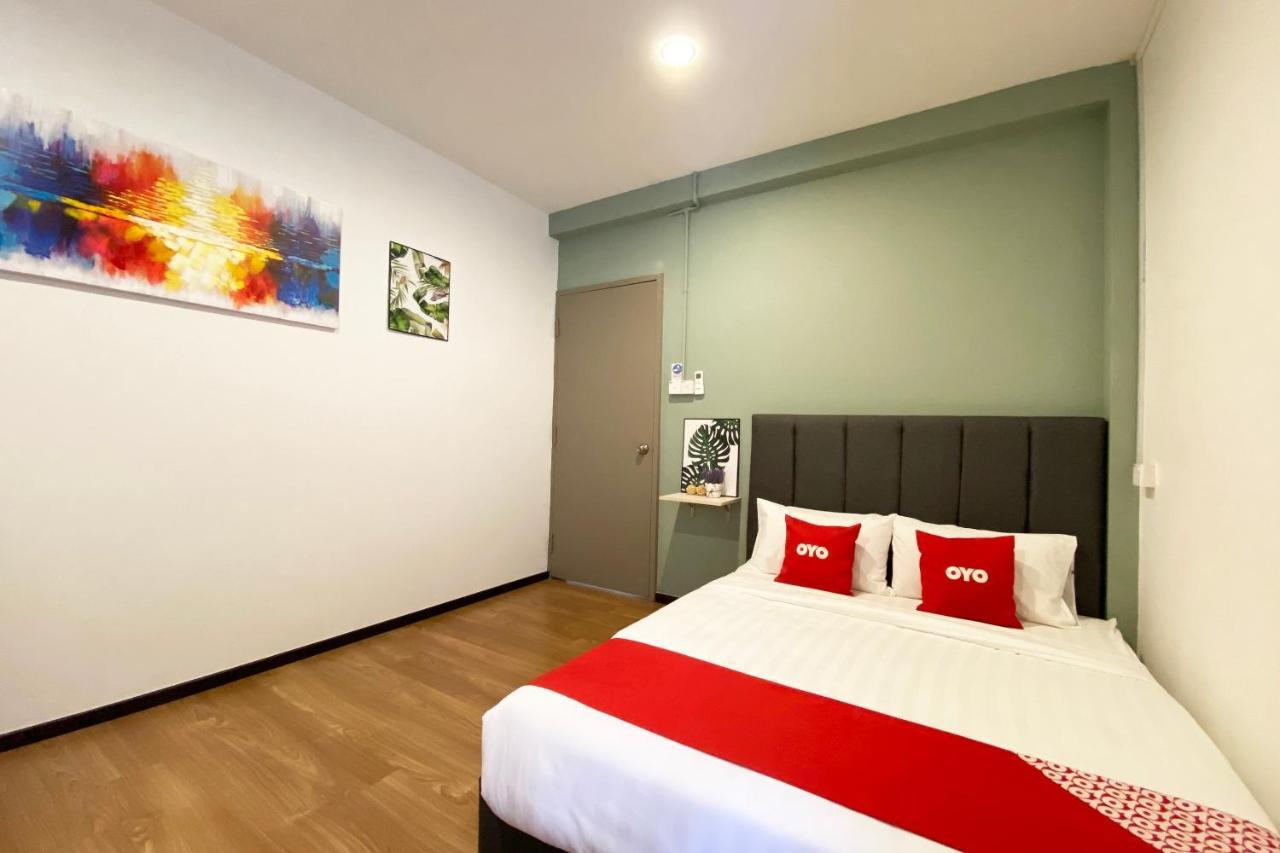 Oyo 89603 Treeline Urban Inn Кота-Кинабалу Экстерьер фото