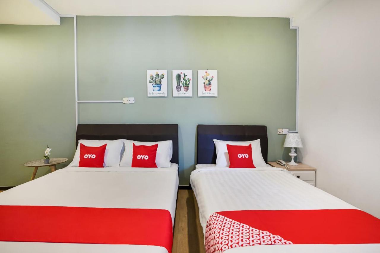 Oyo 89603 Treeline Urban Inn Кота-Кинабалу Экстерьер фото