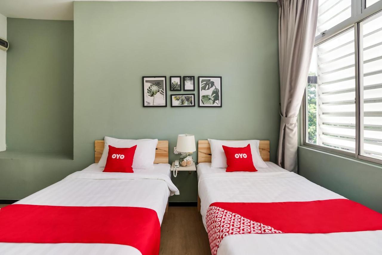 Oyo 89603 Treeline Urban Inn Кота-Кинабалу Экстерьер фото