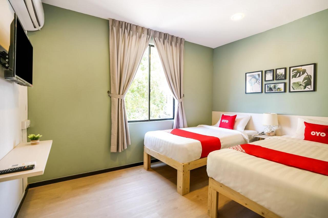 Oyo 89603 Treeline Urban Inn Кота-Кинабалу Экстерьер фото