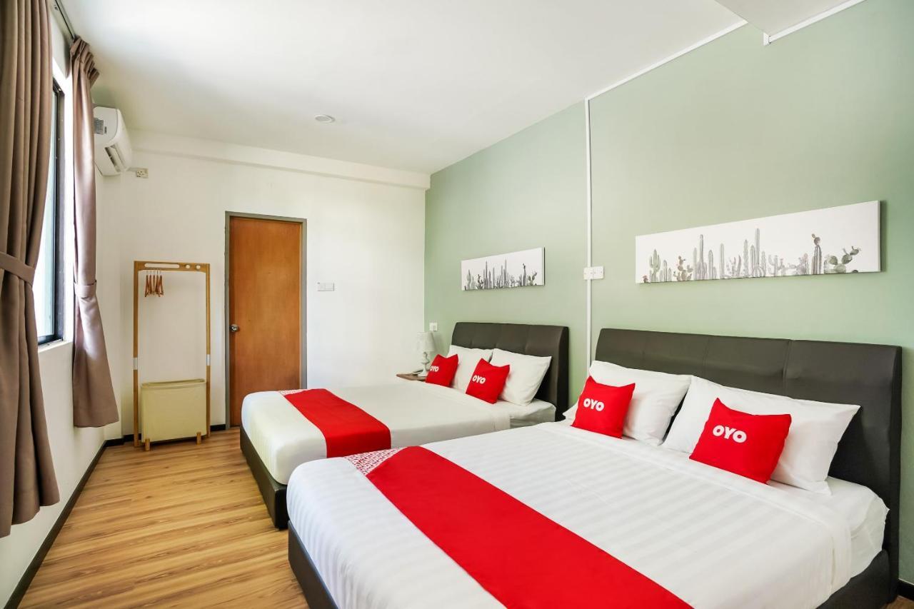 Oyo 89603 Treeline Urban Inn Кота-Кинабалу Экстерьер фото
