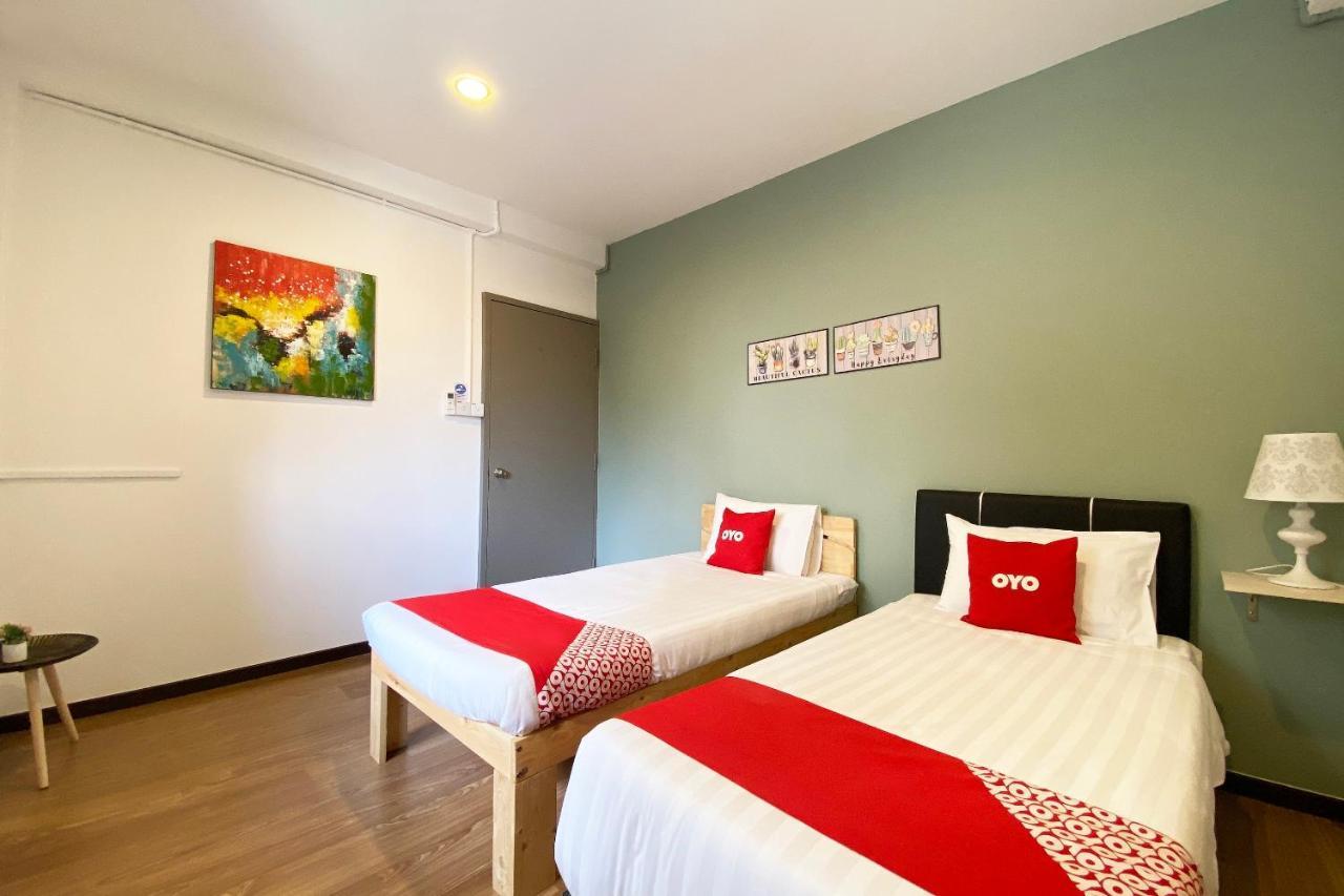 Oyo 89603 Treeline Urban Inn Кота-Кинабалу Экстерьер фото
