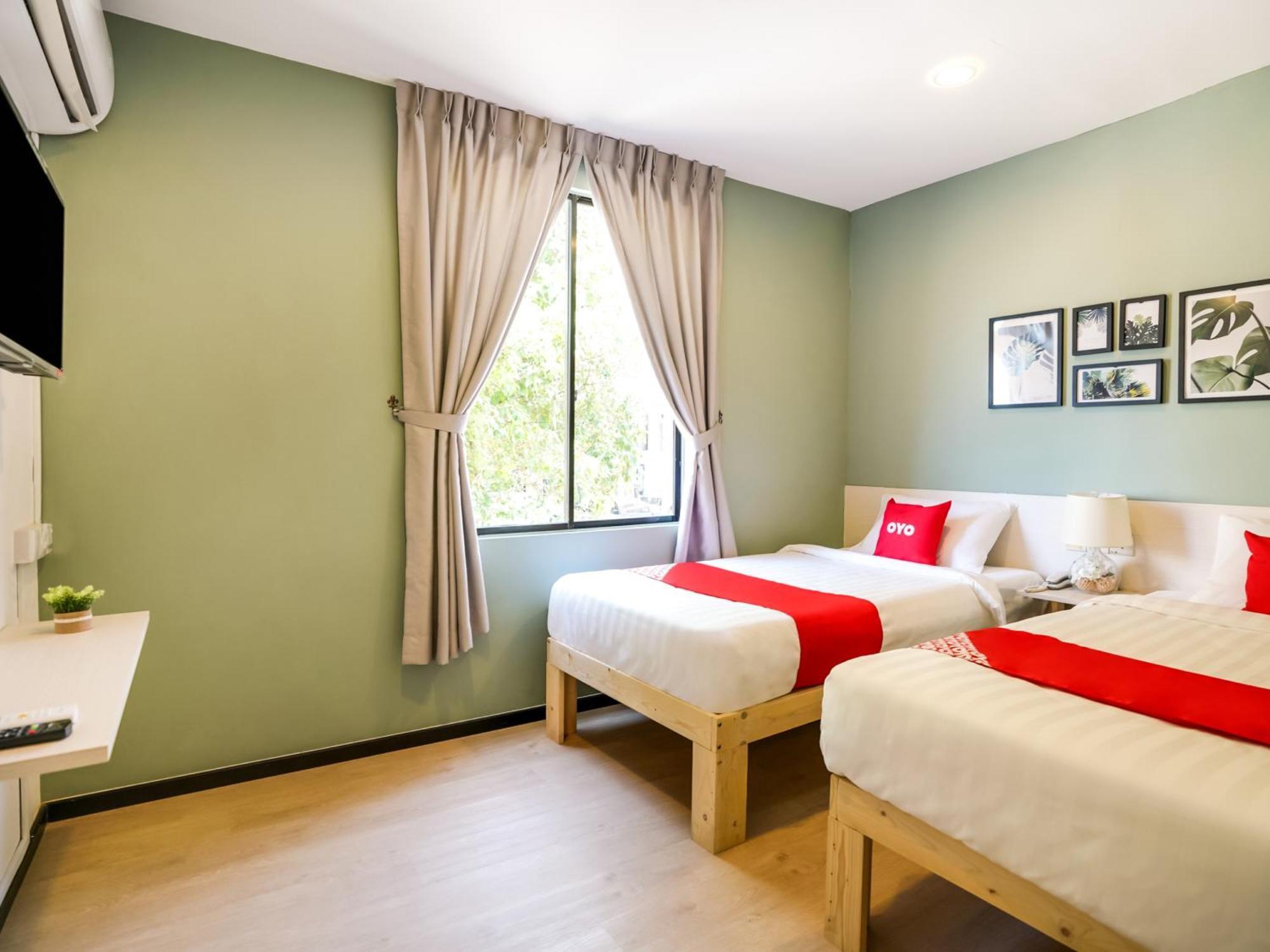 Oyo 89603 Treeline Urban Inn Кота-Кинабалу Экстерьер фото