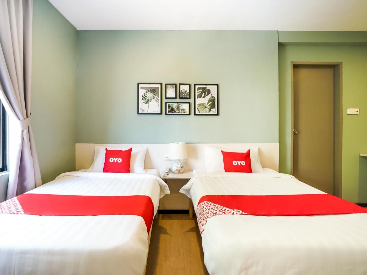 Oyo 89603 Treeline Urban Inn Кота-Кинабалу Экстерьер фото