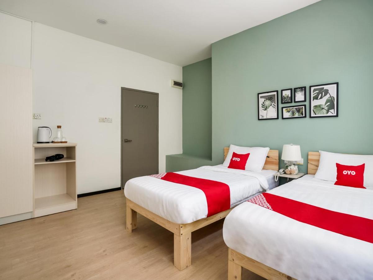 Oyo 89603 Treeline Urban Inn Кота-Кинабалу Экстерьер фото